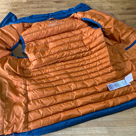 cotopaxi Teal Packable Down Vest with Blue and Orange Stripes - Picture 5 of 5